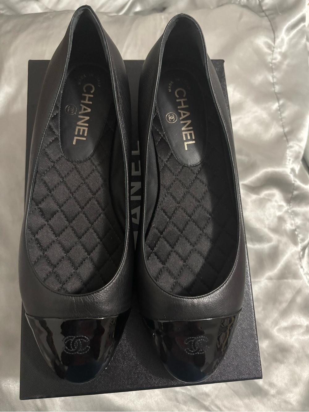 CHANEL Black Leather Ballet Flats with Patent Cap Toe